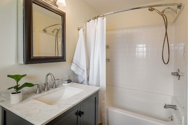 bathroom featuring shower / tub combo with curtain and vanity