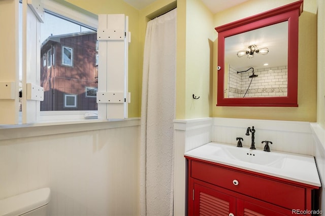 bathroom with vanity and toilet