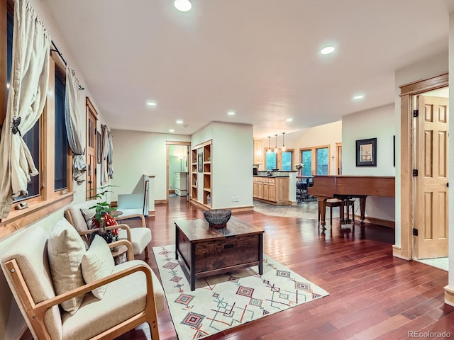 845 Urban St, Lakewood, CO 80401 - living area with wood finished floors, recessed lighting, and baseboards
