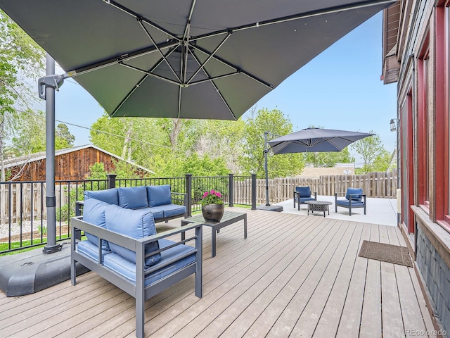 845 Urban St, Lakewood, CO 80401 - wooden deck with an outdoor living space