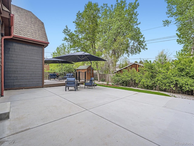 845 Urban St, Lakewood, CO 80401 - fenced backyard with a patio area
