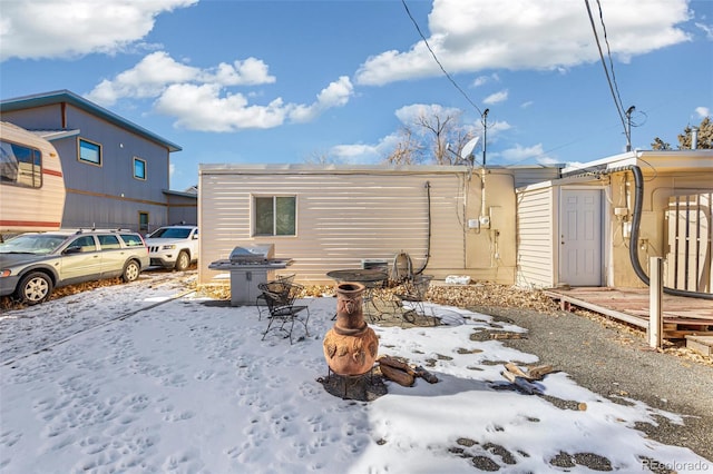 view of snow covered property