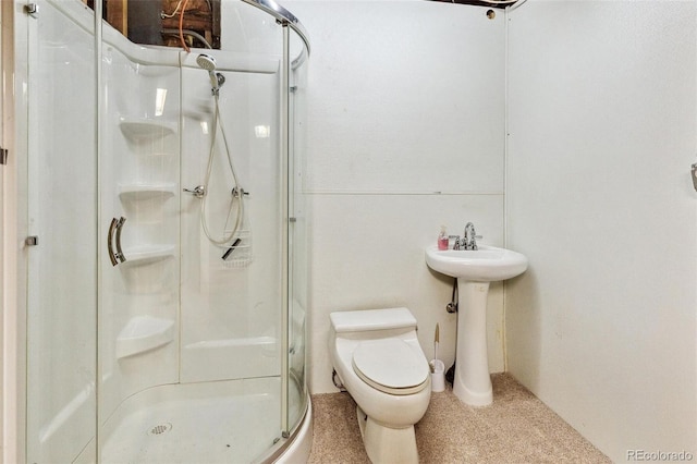 full bathroom with a stall shower and toilet