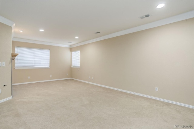 empty room with light carpet and ornamental molding