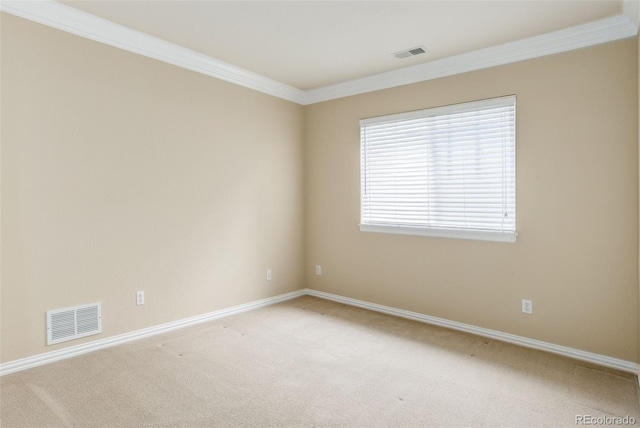 carpeted empty room with ornamental molding