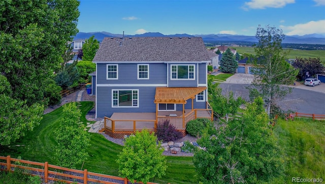 14620 Prairie Sky Ln, Broomfield, CO 80023 - back of property featuring a deck with mountain view