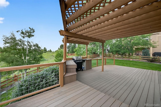 14620 Prairie Sky Ln, Broomfield, CO 80023 - wooden deck with a pergola and grilling area