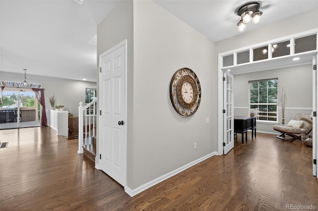 14620 Prairie Sky Ln, Broomfield, CO 80023 - corridor featuring plenty of natural light, dark wood finished floors, and recessed lighting