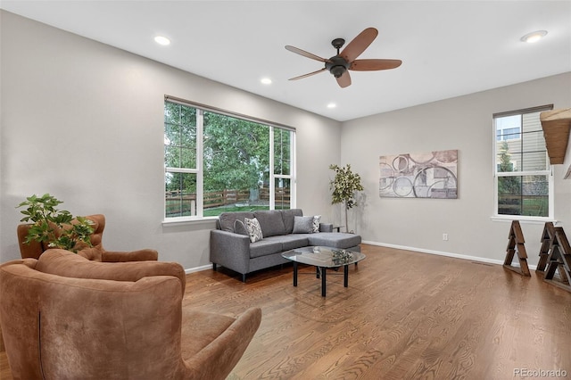 14620 Prairie Sky Ln, Broomfield, CO 80023 - living area with wood finished floors, a ceiling fan, and recessed lighting