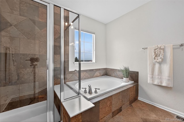 14620 Prairie Sky Ln, Broomfield, CO 80023 - full bath featuring a bath and a stall shower