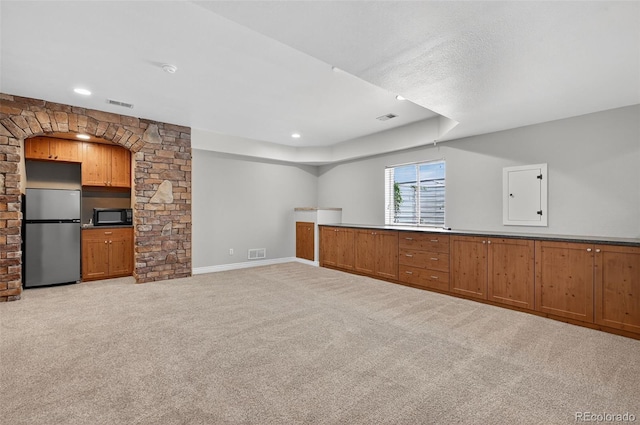 14620 Prairie Sky Ln, Broomfield, CO 80023 - unfurnished living room with light carpet and recessed lighting