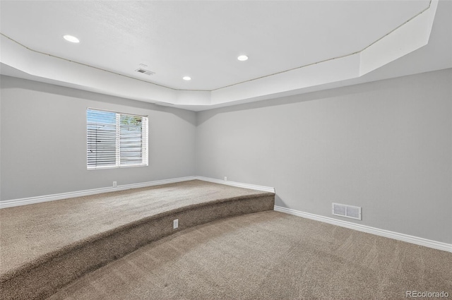 14620 Prairie Sky Ln, Broomfield, CO 80023 - spare room with carpet, a raised ceiling, and recessed lighting