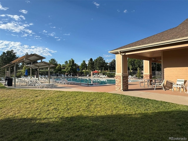 14620 Prairie Sky Ln, Broomfield, CO 80023 - community pool with a lawn and a patio area
