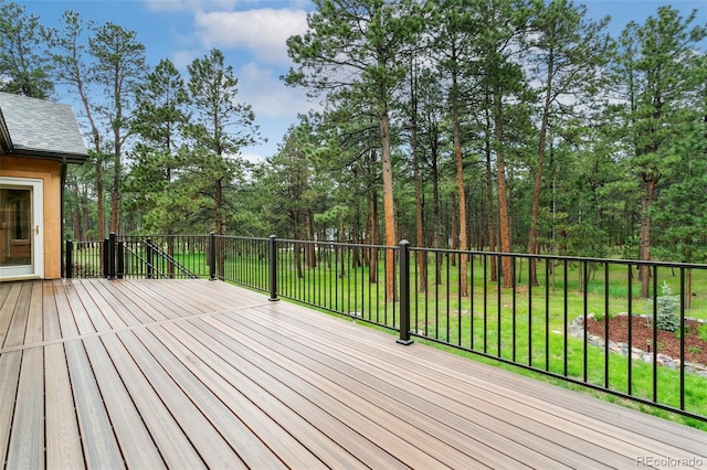 19770 Roaming Dr, Colorado Springs, CO 80908 - wooden terrace with a yard
