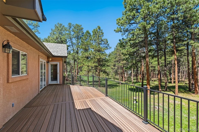 19770 Roaming Dr, Colorado Springs, CO 80908 - wooden terrace with a lawn