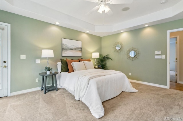 19770 Roaming Dr, Colorado Springs, CO 80908 - bedroom with carpet floors, a raised ceiling, recessed lighting, and ceiling fan