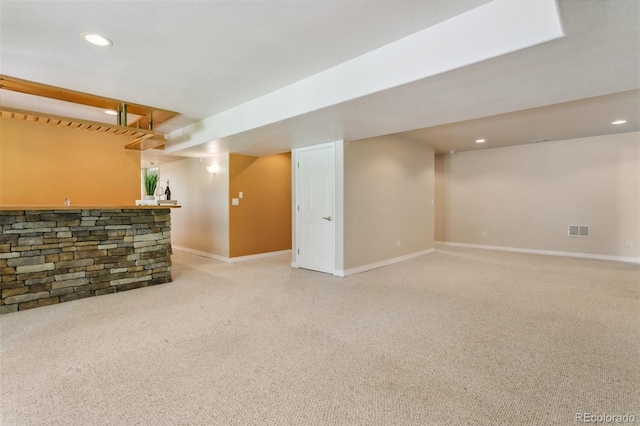 19770 Roaming Dr, Colorado Springs, CO 80908 - finished below grade area with bar area, light carpet, and recessed lighting