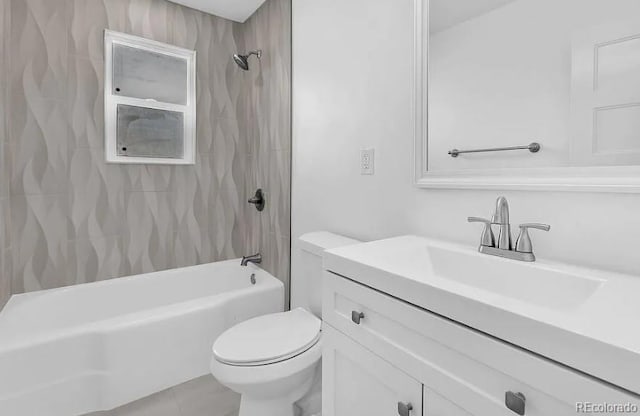 full bath with bathing tub / shower combination, vanity, and toilet