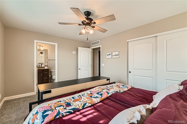 carpeted bedroom with connected bathroom, a closet, and ceiling fan