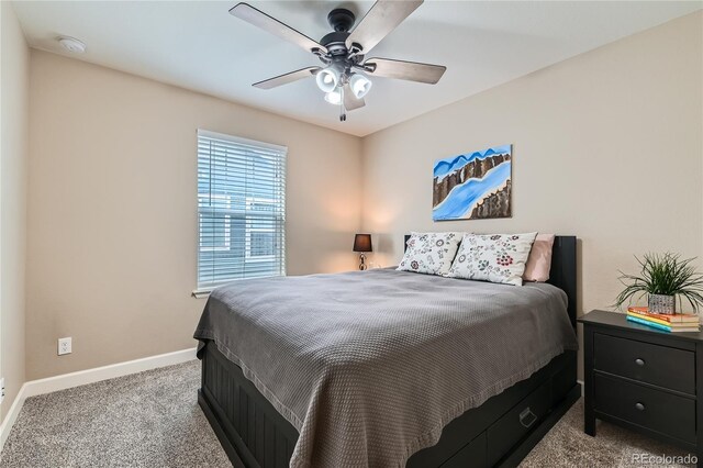 carpeted bedroom featuring ceiling fan