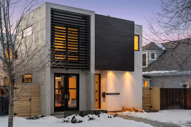 view of snow covered house