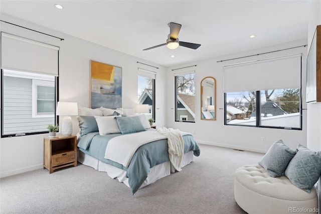 carpeted bedroom featuring ceiling fan