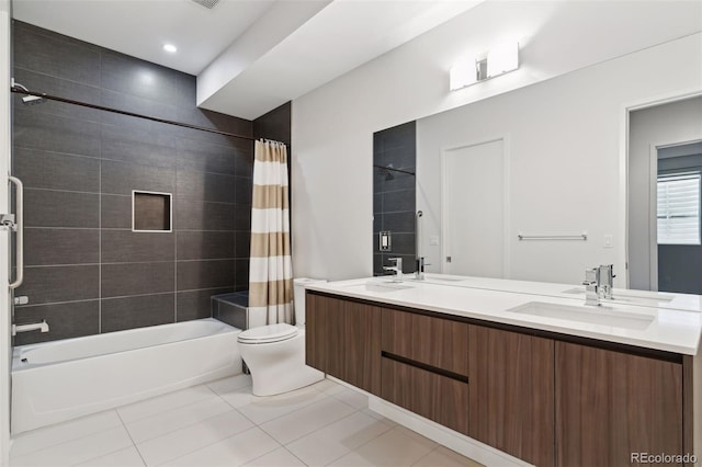 full bathroom featuring toilet, tile patterned floors, shower / bathtub combination with curtain, and vanity