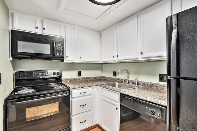 kitchen with sink, white cabinets, black appliances, and ornamental molding