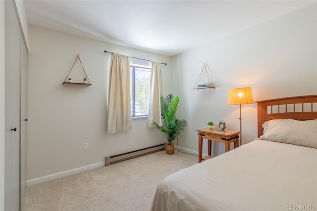 bedroom featuring carpet, baseboards, and baseboard heating