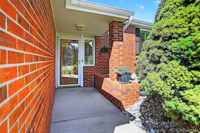 9356 W Geddes Pl, Littleton, CO 80128 - property entrance featuring brick siding