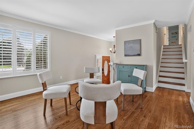 9356 W Geddes Pl, Littleton, CO 80128 - living area featuring ornamental molding, wood finished floors, stairway, and a chandelier