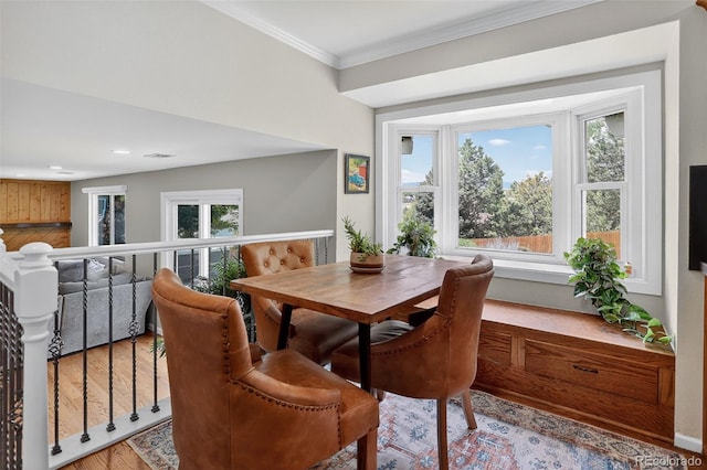 9356 W Geddes Pl, Littleton, CO 80128 - dining space featuring wood finished floors and ornamental molding