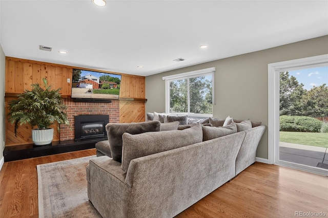 9356 W Geddes Pl, Littleton, CO 80128 - living room with a fireplace, light wood finished floors, and recessed lighting
