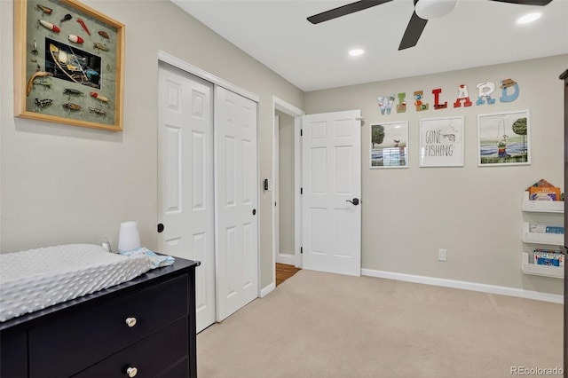 9356 W Geddes Pl, Littleton, CO 80128 - bedroom with light colored carpet, a closet, recessed lighting, and a ceiling fan
