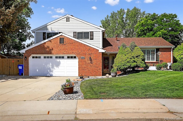 9356 W Geddes Pl, Littleton, CO 80128 - traditional home featuring concrete driveway, brick siding, and a shingled roof