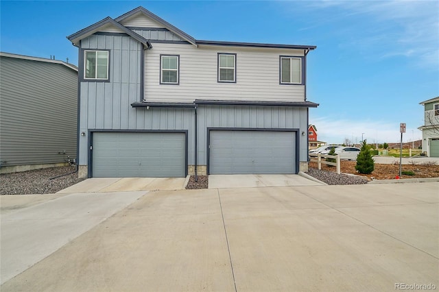 18059 French Creek Ave, Parker, CO 80134 - view of front of home featuring driveway, board and batten siding, and a garage