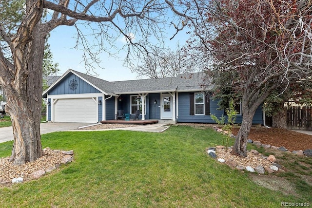 20908 E Dorado Cir, Centennial, CO 80015 - ranch-style home featuring a garage, driveway, covered porch, board and batten siding, and roof with shingles