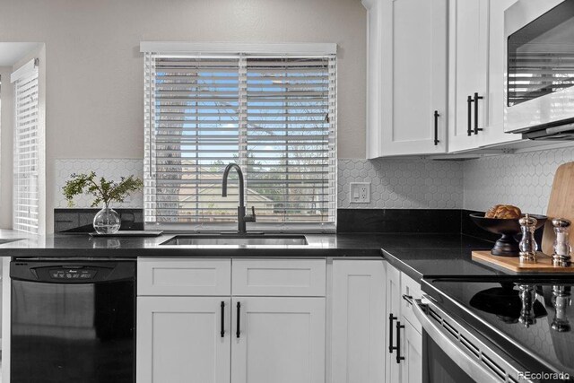 20908 E Dorado Cir, Centennial, CO 80015 - kitchen featuring black dishwasher, stainless steel microwave, a sink, white cabinetry, and dark countertops