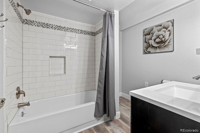 20908 E Dorado Cir, Centennial, CO 80015 - bathroom with wood finished floors, shower / tub combo with curtain, and a sink