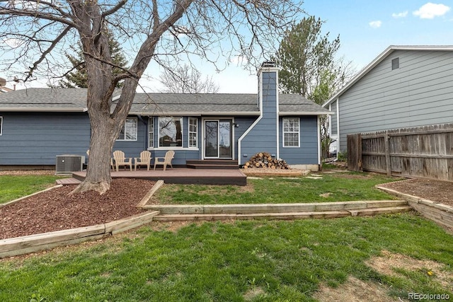 20908 E Dorado Cir, Centennial, CO 80015 - rear view of house featuring central AC, a chimney, and roof with shingles