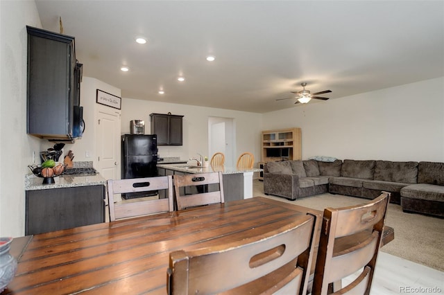 dining space featuring a ceiling fan and recessed lighting