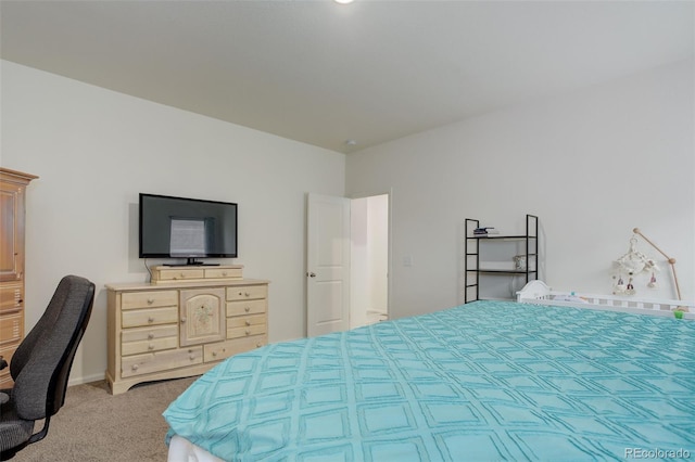 bedroom featuring baseboards and light colored carpet