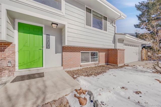 entrance to property featuring a garage