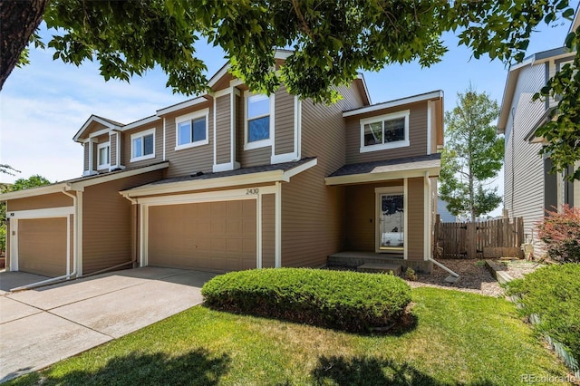 2430 E 109th Dr, Northglenn, CO 80233 - view of front of property with an attached garage and driveway