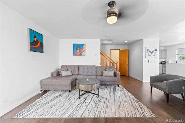 2430 E 109th Dr, Northglenn, CO 80233 - living area featuring wood finished floors, stairway, a ceiling fan, and recessed lighting
