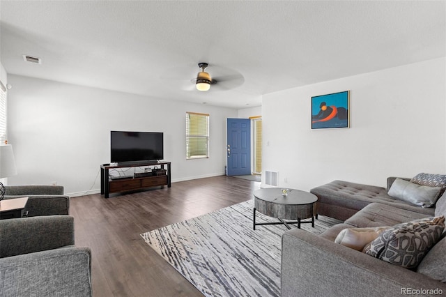 2430 E 109th Dr, Northglenn, CO 80233 - living area featuring dark wood-type flooring and a ceiling fan