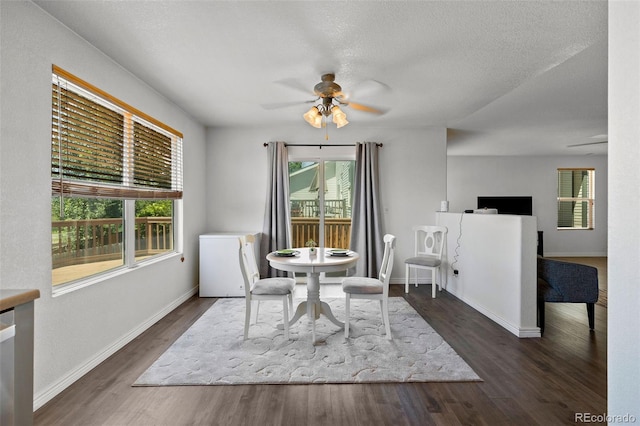 2430 E 109th Dr, Northglenn, CO 80233 - dining area featuring a ceiling fan, plenty of natural light, wood finished floors, and a textured ceiling