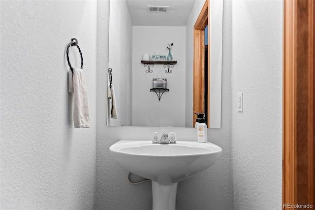 2430 E 109th Dr, Northglenn, CO 80233 - bathroom with a textured wall