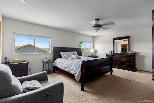 2430 E 109th Dr, Northglenn, CO 80233 - carpeted bedroom with a ceiling fan