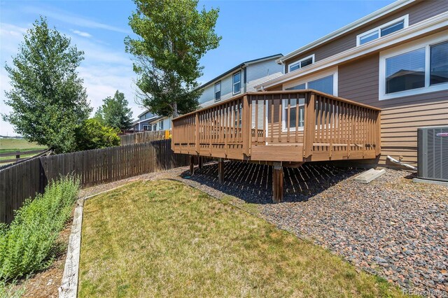 2430 E 109th Dr, Northglenn, CO 80233 - fenced backyard featuring a wooden deck